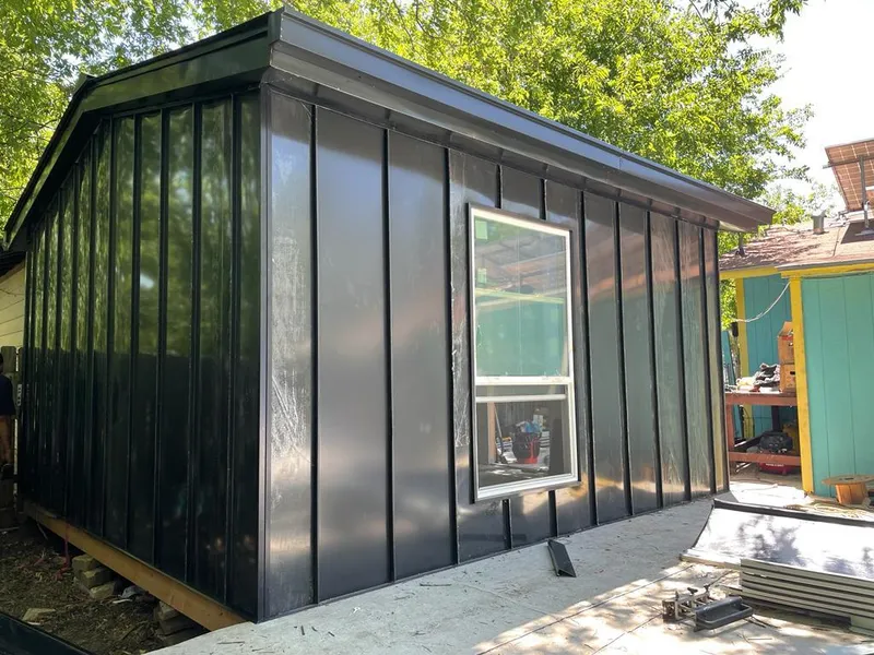 Black standing seam metal wall panels for Metal Roof Installation in Islip